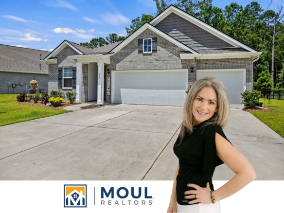 Agent in front of property - 419 Great Harvest