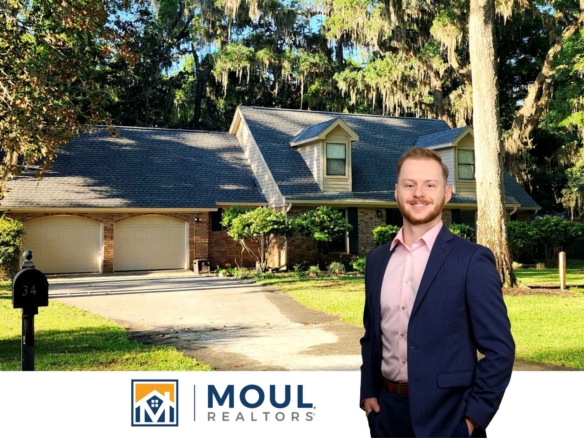 34 Chesterfield Lake Dr - Agent in front of property